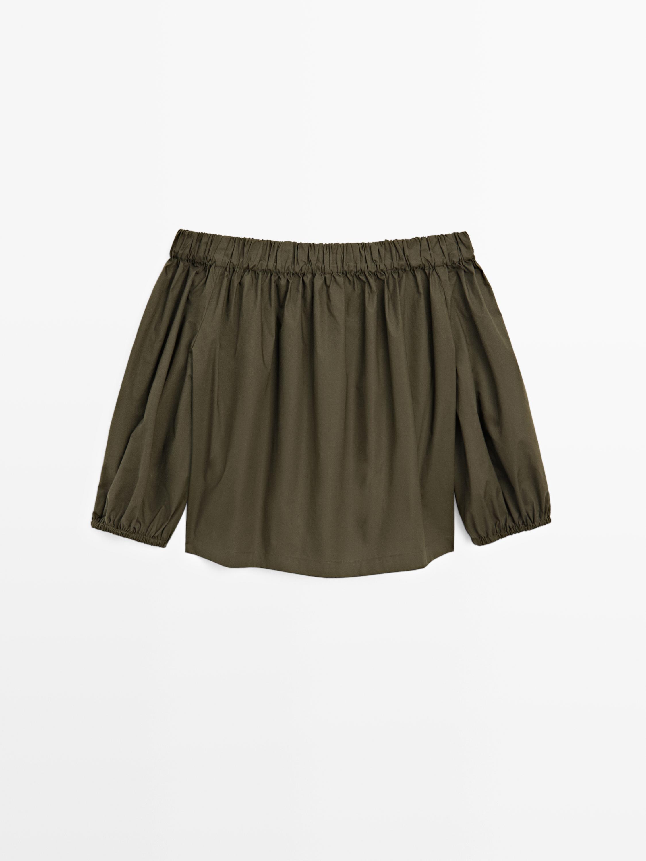 Voluminous boat neck top